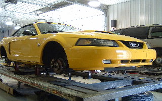Picture of car on frame machine